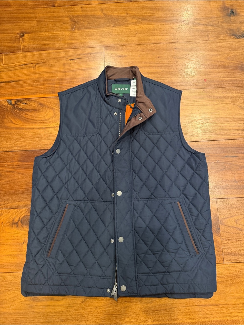 Orvis Route 7 quilted vest. NWT large, navy with pumpkin interior.